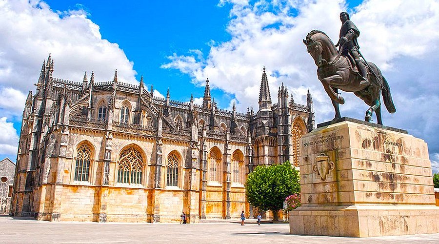 Batalha Monastery in Portugal, a UNESCO World Heritage Site and masterpiece of Gothic architecture, visited during the Fátima, Batalha, Nazaré & Óbidos Private Day Tour by Lux Motion.