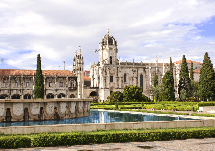 Belém district in Lisbon with the Tower of Belém, Jerónimos Monastery, and the Tagus River — featured in the Lisbon Immersive Day Tour by Lux Motion