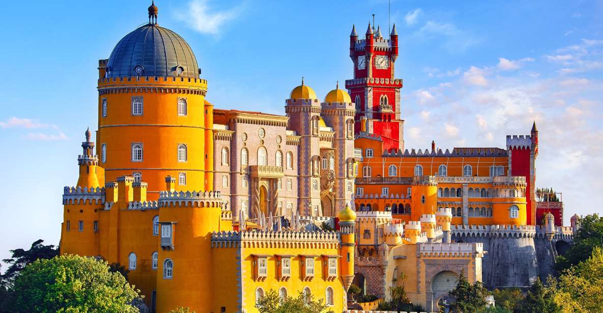 Pena Palace in Sintra, a colorful Romantic architecture landmark with panoramic views, featured in the Lisbon Immersive Day Tour by Lux Motion.