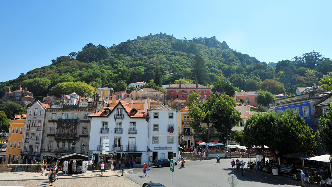 Historic Center of Sintra with tiled villas, charming cafés and Travesseiros pastry shops, part of the Lisbon Immersive Day Tour by Lux Motion.